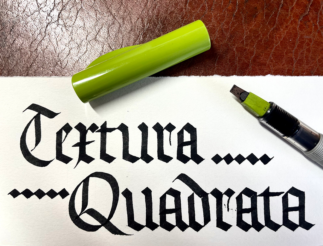 "Not just medieval" blackletter calligraphy by Katie Leavens with green-topped parallel pen