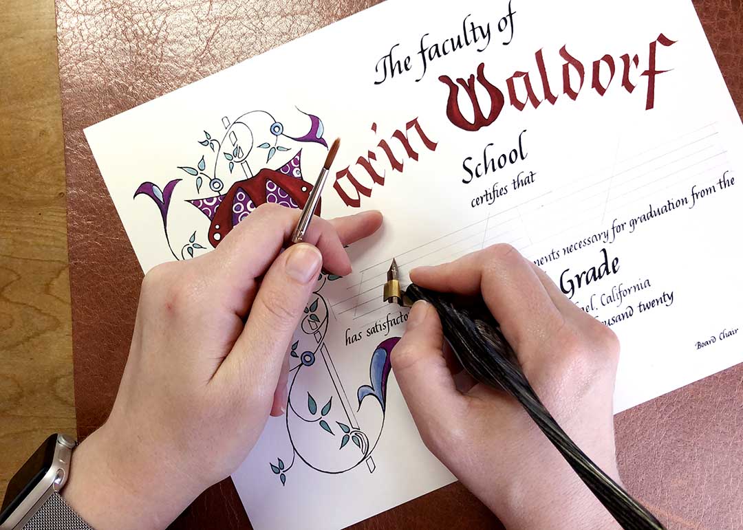 Reenacting writing names on Marin Waldorf School 2020 Diploma by Katie Leavens