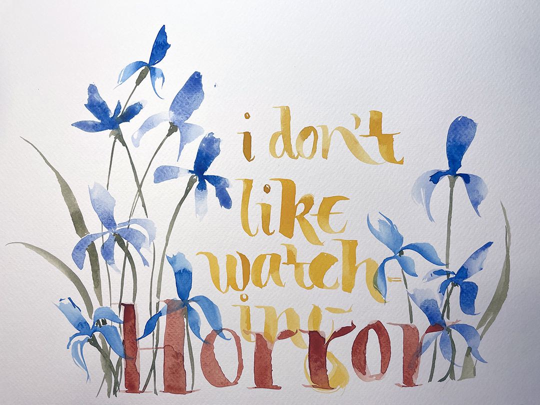 watercolor painted irises in blue with green stems and leaves overlaid with yellow lettering "i don't like watching" with red "Horror" lettering layered in front by Katie Leavens