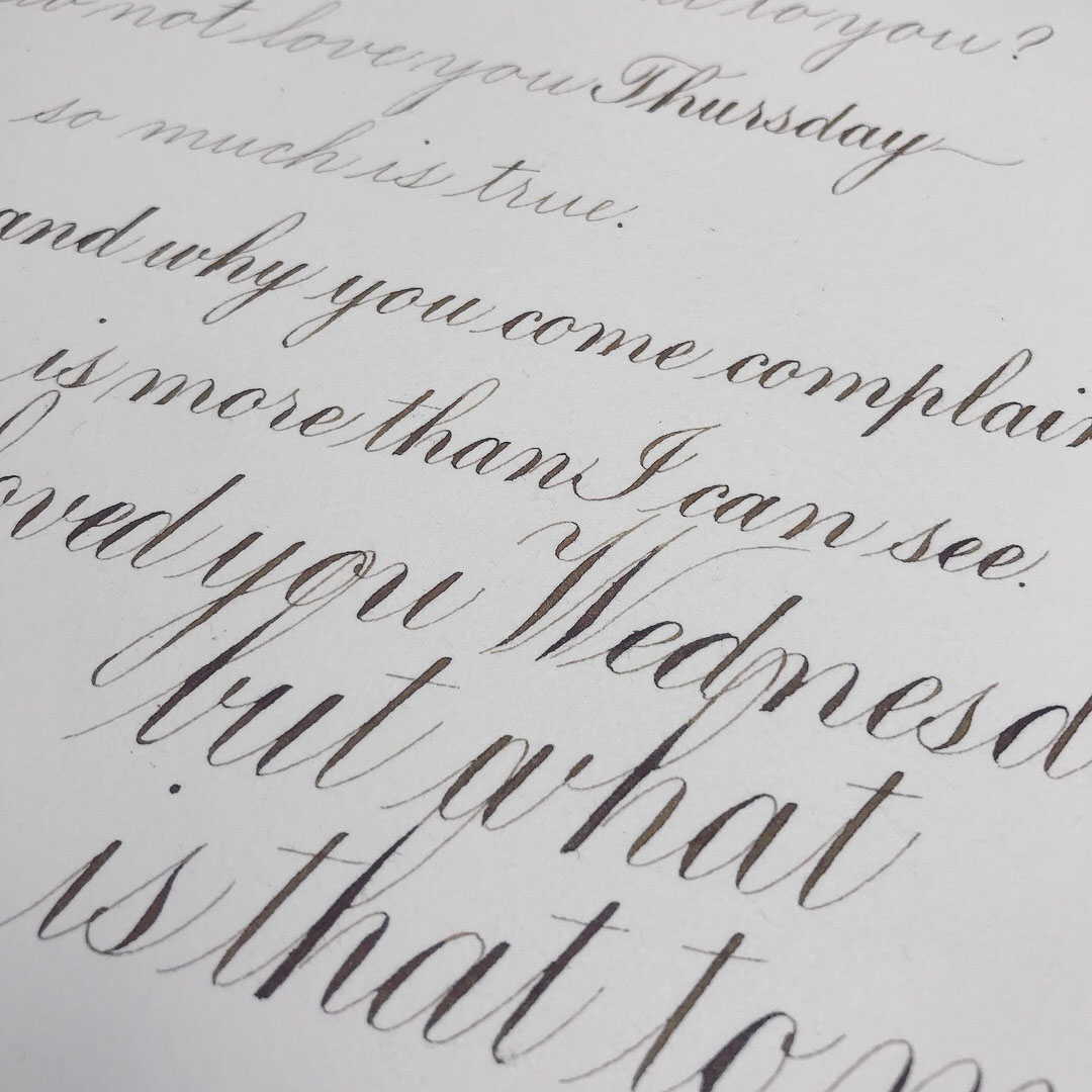 Close up on Calligraphic Edna St. Vincent Millay Poem by Katie Leavens
