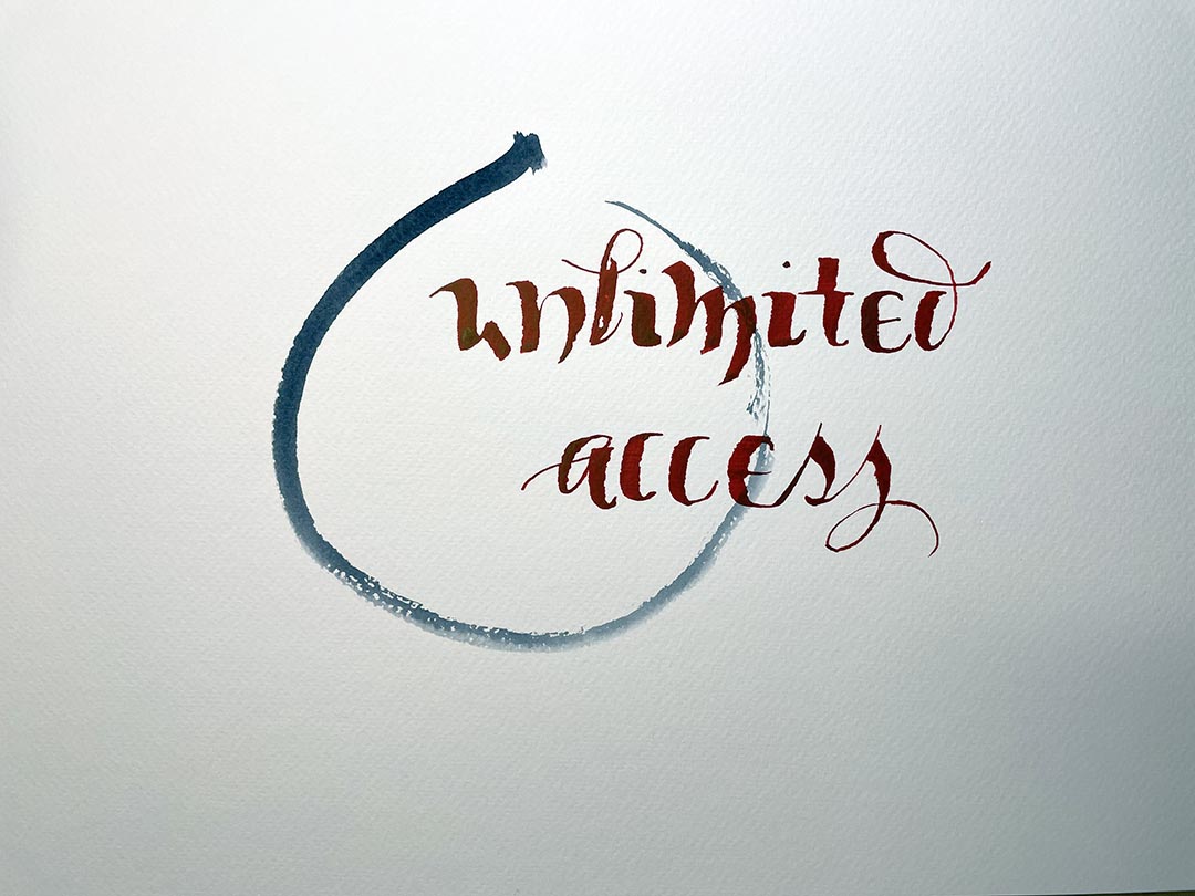 indigo open circle with brush lettering 'unlimited access'