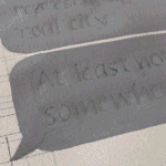 Erasing drawing gum to reveal paper lettering beneath by Katie Leavens